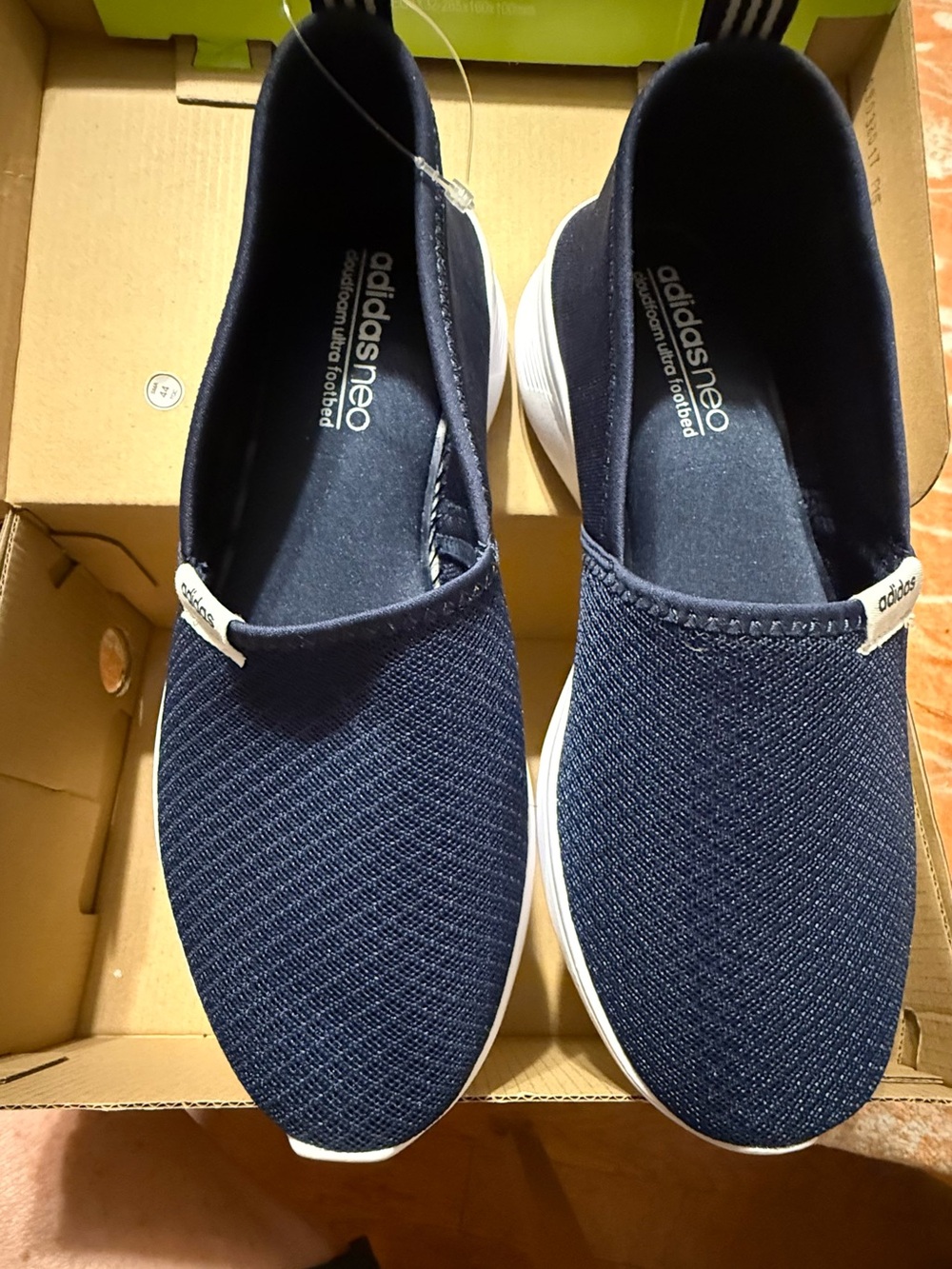 ADIDAS Navy Slip-On Knit Loafers with White Soles
Size 6.5